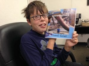 thomas-with-biggest-little-photographer-proof-book-10-4-16